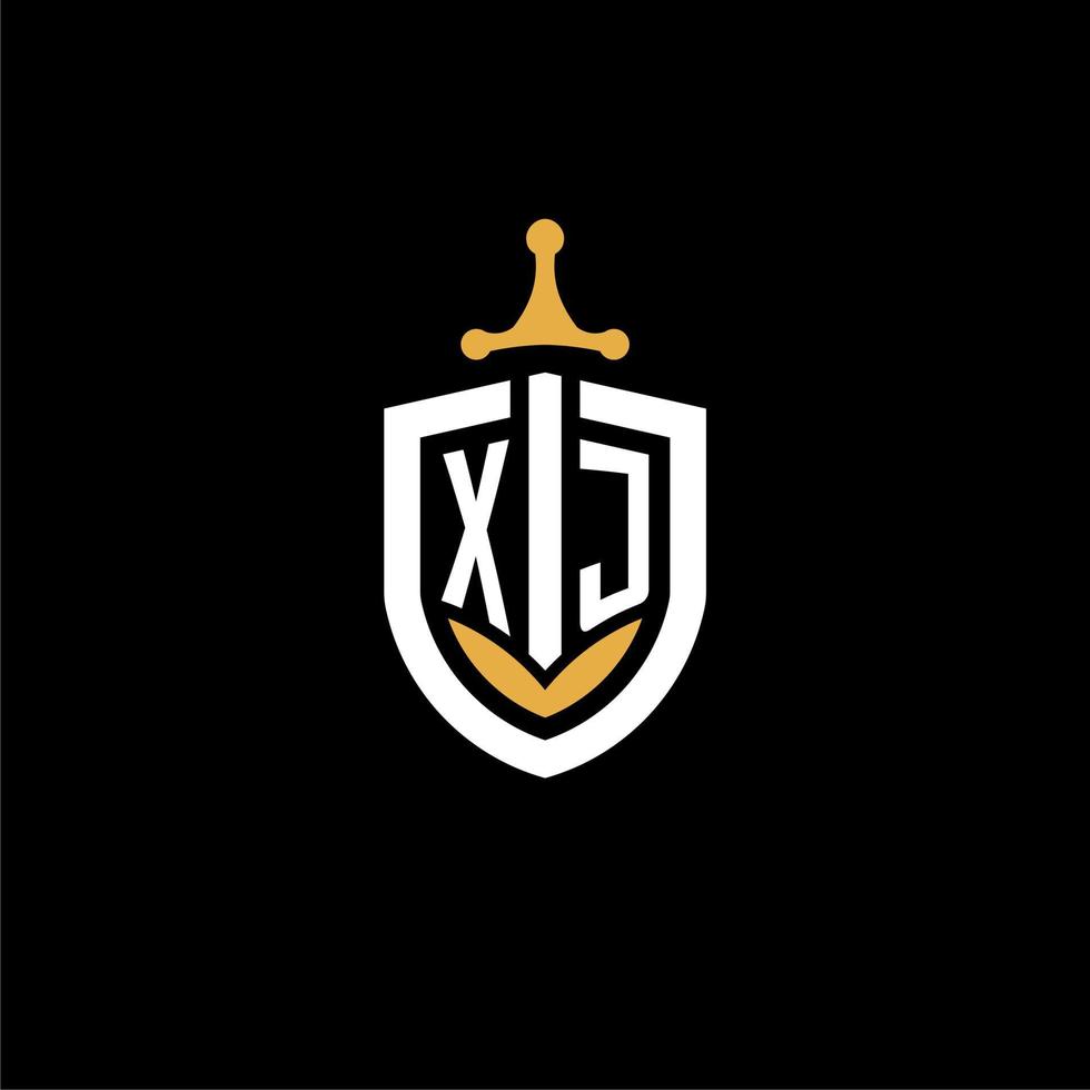 creativo lettera xj logo gioco esport con scudo e spada design idee vettore
