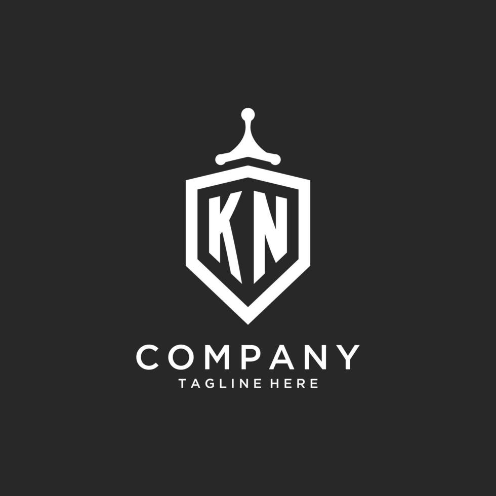 kn monogramma logo iniziale con scudo guardia forma design vettore