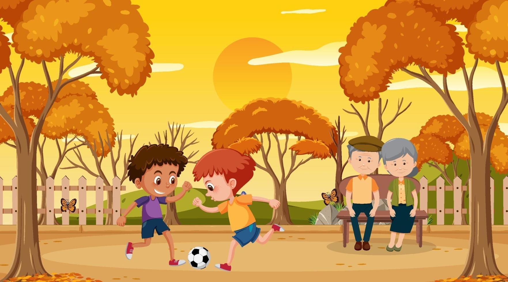 parco alla scena del tramonto con bambini che giocano a calcio vettore