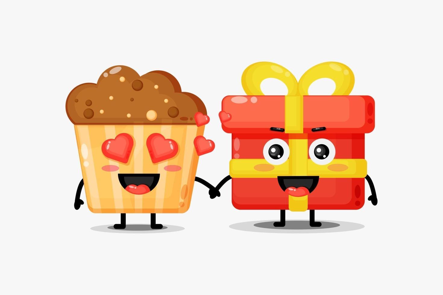 simpatici muffin e scatole regalo mascotte tenendosi per mano vettore