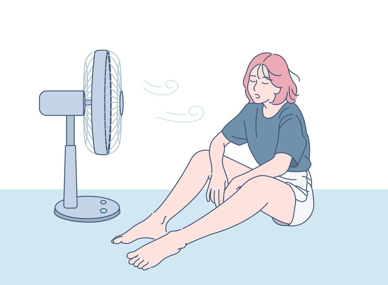 una ragazza è seduta davanti a un ventilatore per rinfrescarsi. illustrazioni di disegno vettoriale stile disegnato a mano.