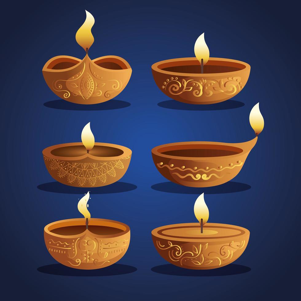 felice diwali diya candele impostato su sfondo blu disegno vettoriale