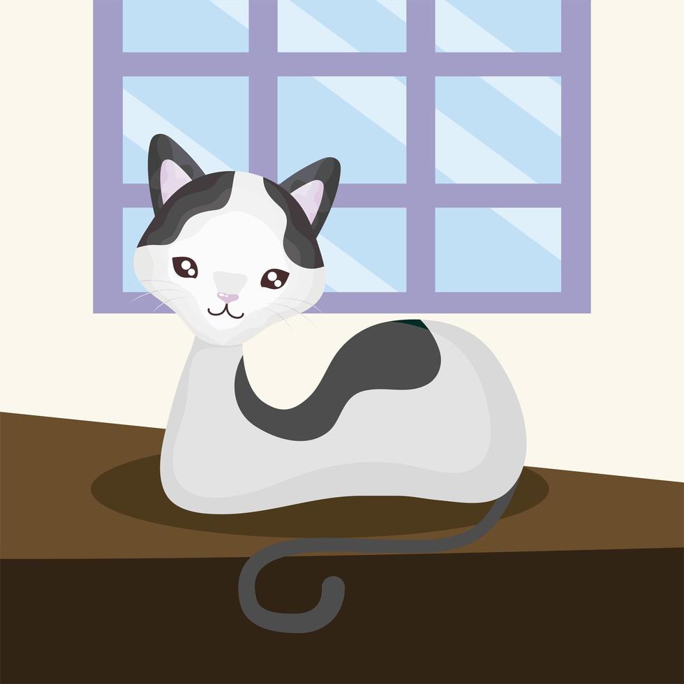 carino piccolo gatto che riposa sul tavolo animale domestico del fumetto vettore