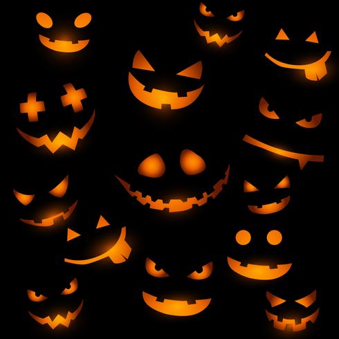 Sfondo di Halloween con facce incandescente di zucca vettore