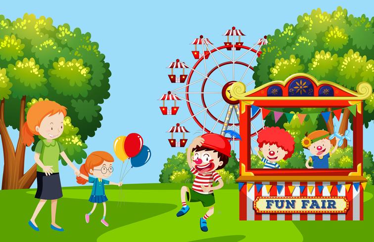 Bambini che visitano la fiera del divertimento vettore