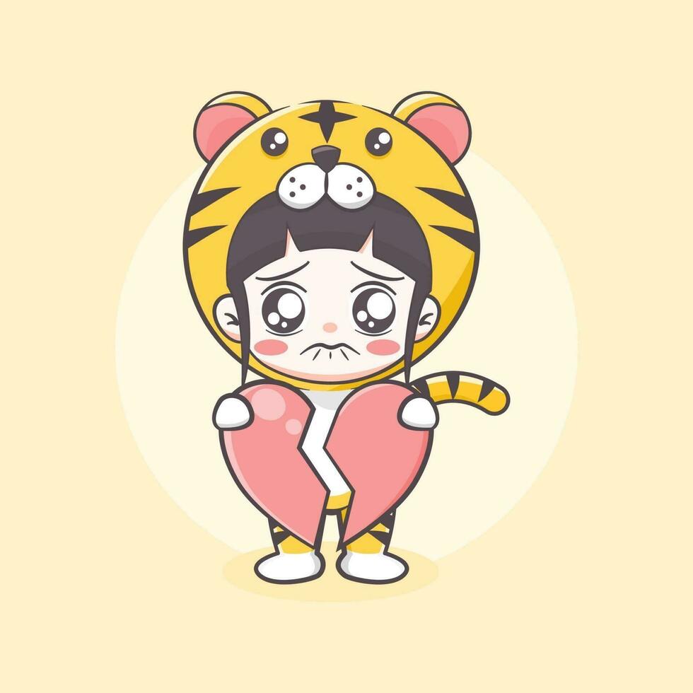 ragazza carina in costume da tigre che tiene in mano un'illustrazione di cartone animato con un focolare rotto vettore