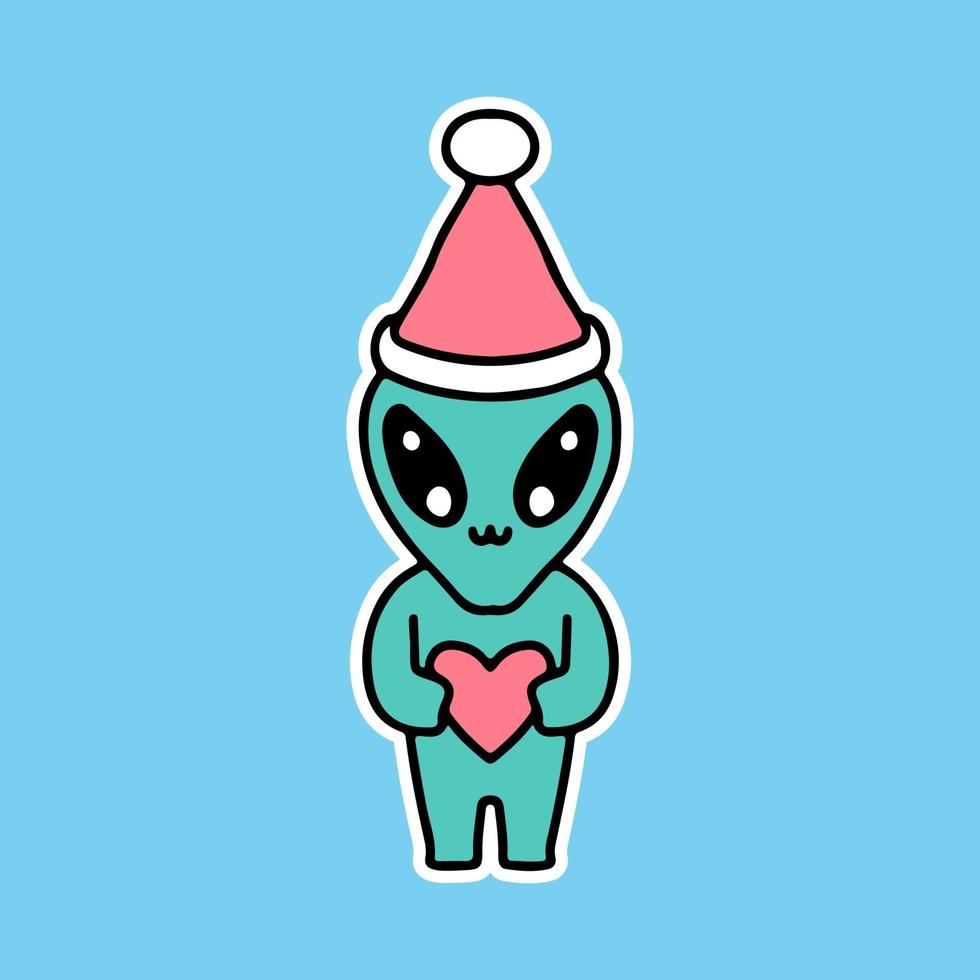 piccolo alieno con cappello di Babbo Natale che tiene il cuore, cartone animato, per adesivi vettore