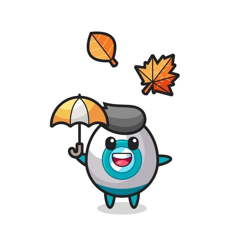 cartone animato del simpatico razzo che tiene un ombrello in autunno vettore