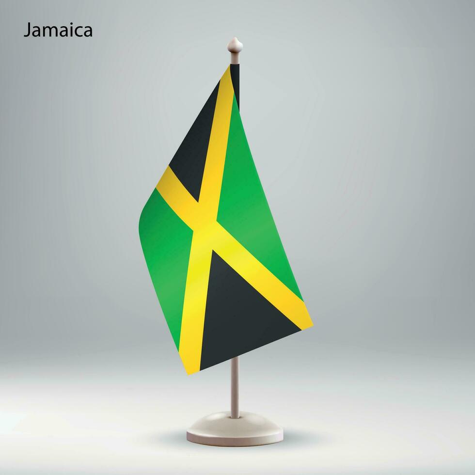 bandiera di Giamaica sospeso su un' bandiera In piedi. vettore