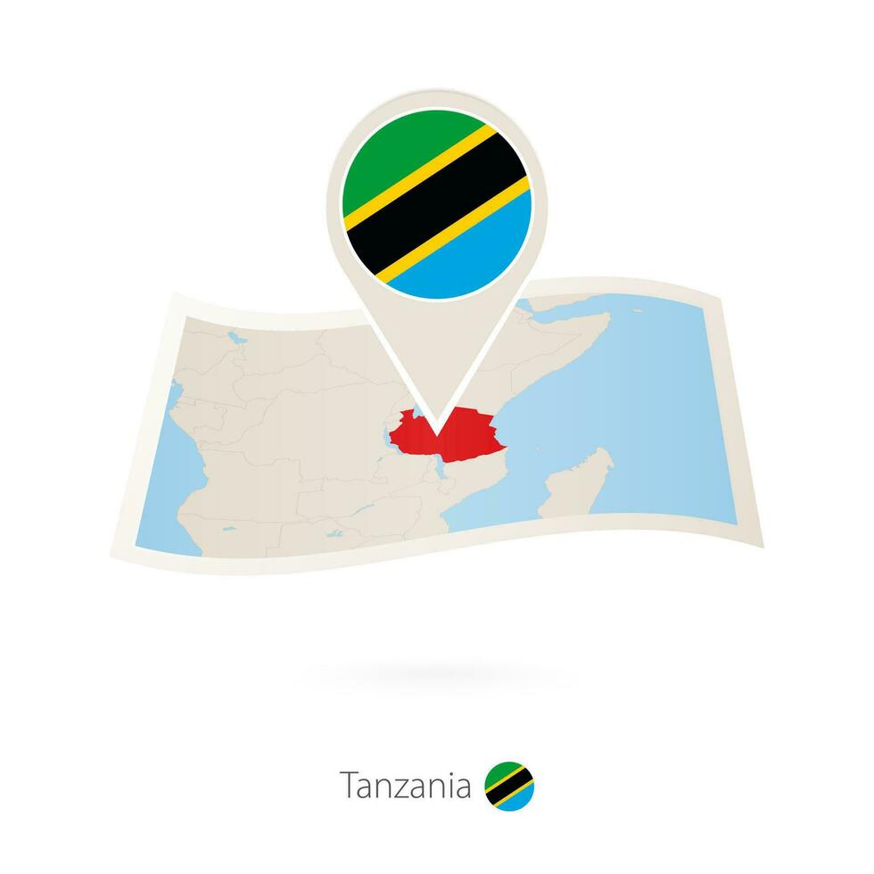 piegato carta carta geografica di Tanzania con bandiera perno di Tanzania. vettore