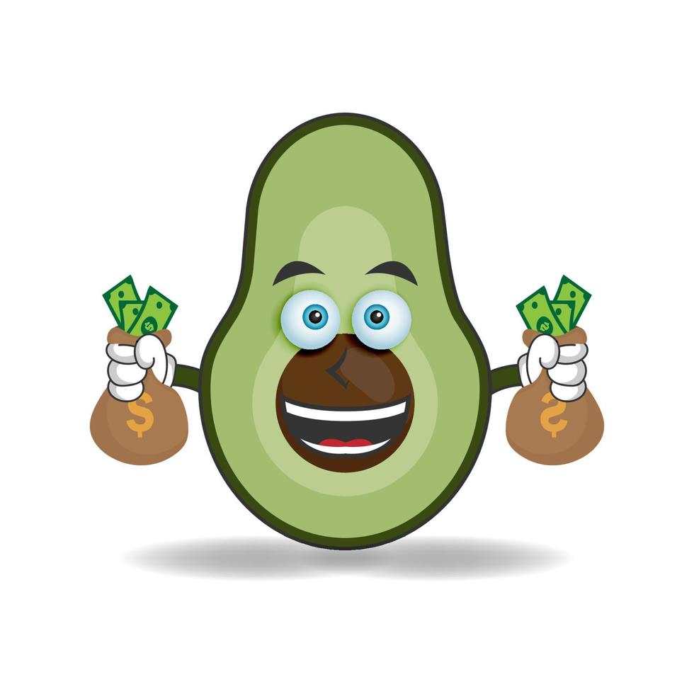 personaggio della mascotte dell'avocado che tiene soldi. illustrazione vettoriale