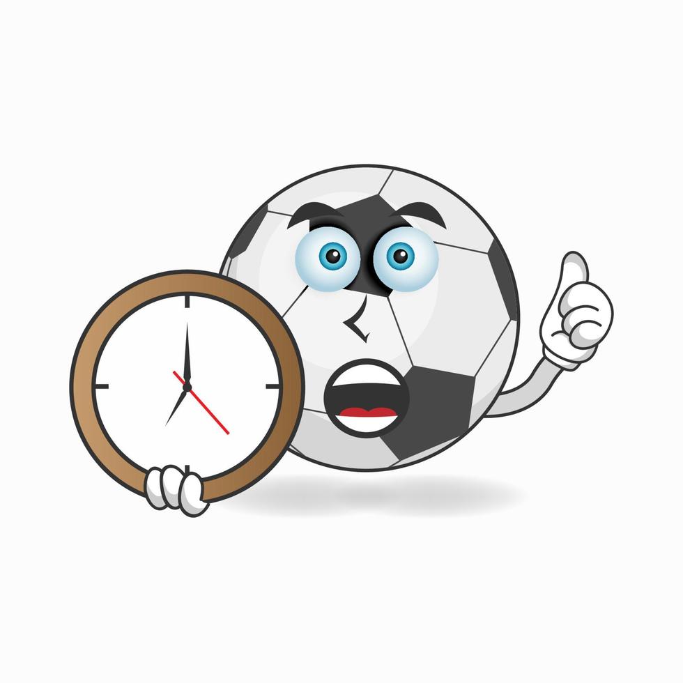 personaggio mascotte pallone da calcio che tiene un orologio da parete. illustrazione vettoriale