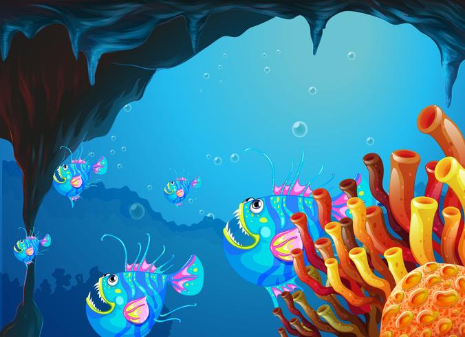 Una grotta sotto il mare con una scuola di pesce vettore