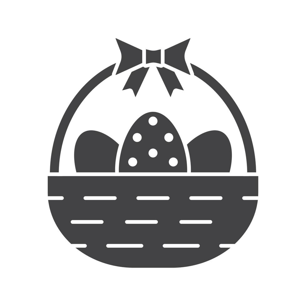 icona del glifo con cestino di Pasqua. simbolo di sagoma. cestino con uova e fiocco. spazio negativo. illustrazione vettoriale isolato