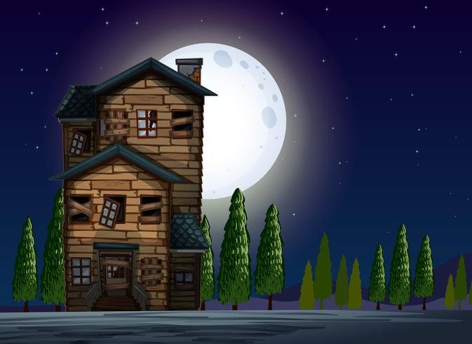 Vecchia casa di legno nella notte di luna piena vettore