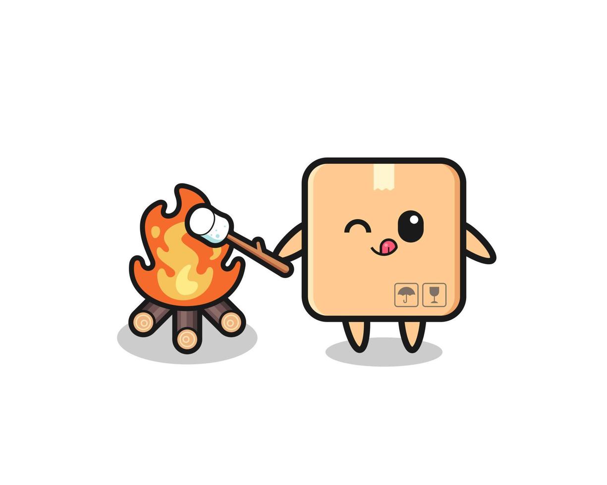il personaggio della scatola di cartone sta bruciando marshmallow vettore