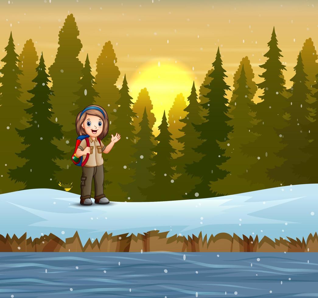una ragazza scout sul paesaggio invernale vettore