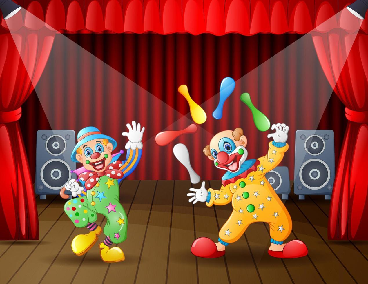 due attrazioni clown sul palco vettore