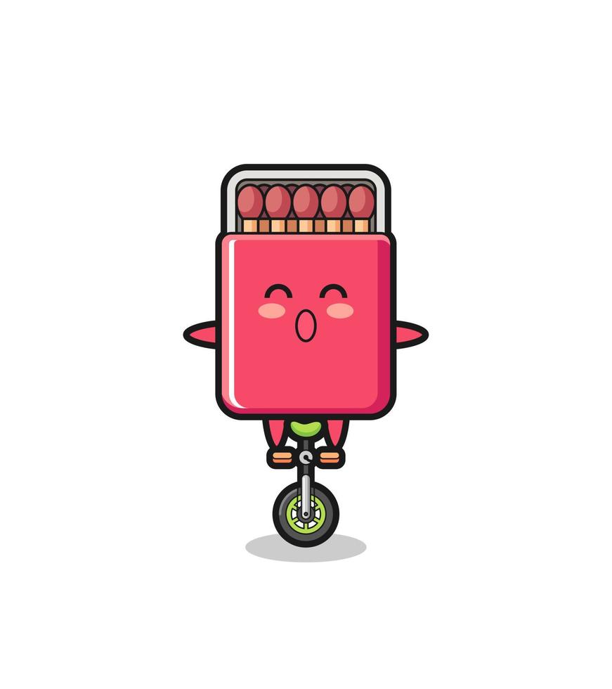 il simpatico personaggio della scatola di fiammiferi sta guidando una bici da circo vettore