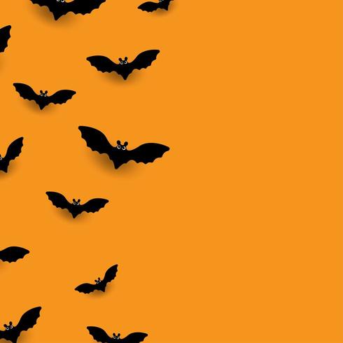 Pipistrelli su sfondo arancione vettore