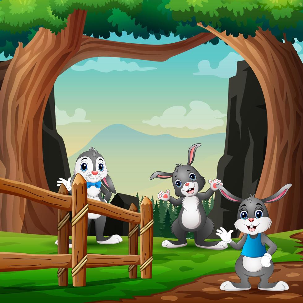 simpatici tre coniglietti che giocano nella natura vettore