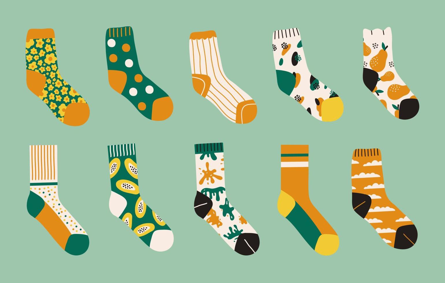 set alla moda di calzini luminosi colorati isolati su sfondo verde. calzini con diverse stampe astratte. illustrazione del fumetto di vettore