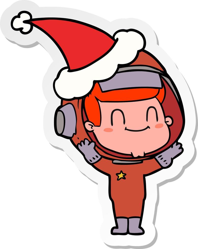 cartone animato adesivo felice di un uomo astronauta che indossa il cappello di Babbo Natale vettore