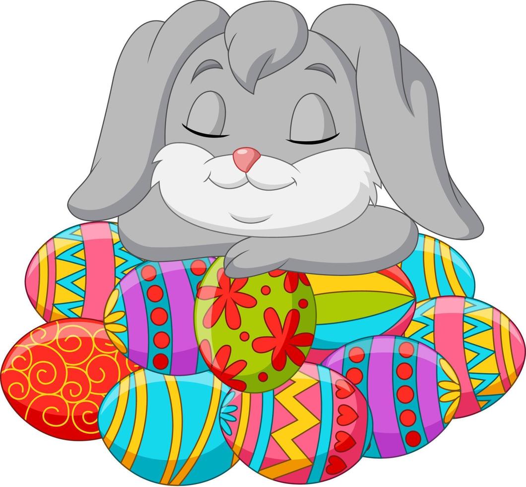 simpatico cartone animato di coniglio che dorme sulle uova di Pasqua vettore
