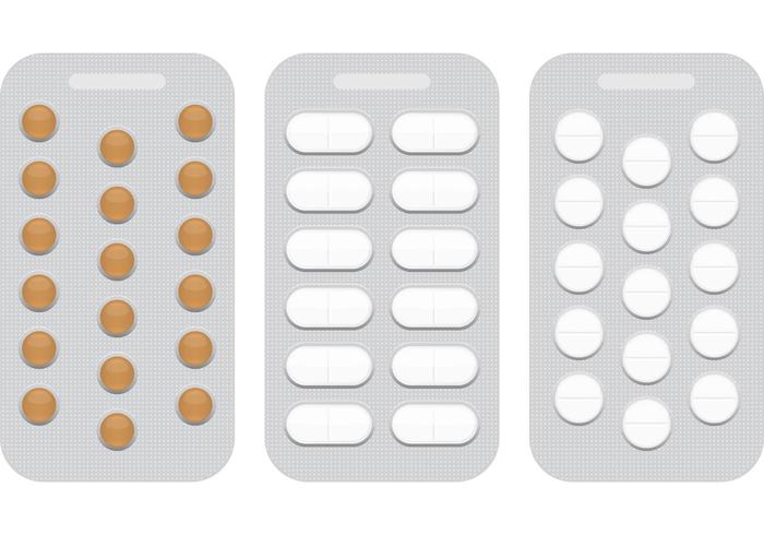 Pillole bianche in blister vettore