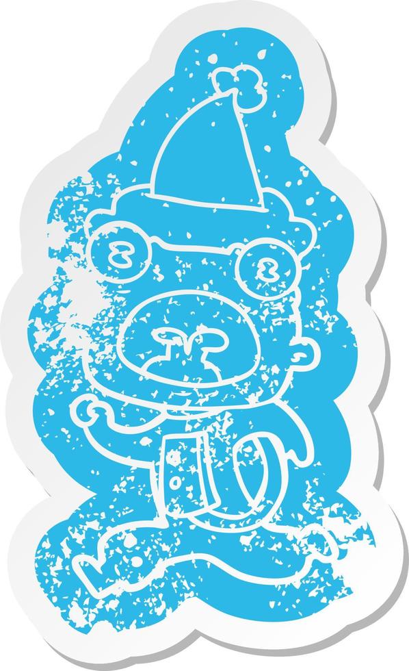 adesivo in cartone animato di uno strano alieno che scappa con il cappello di Babbo Natale vettore