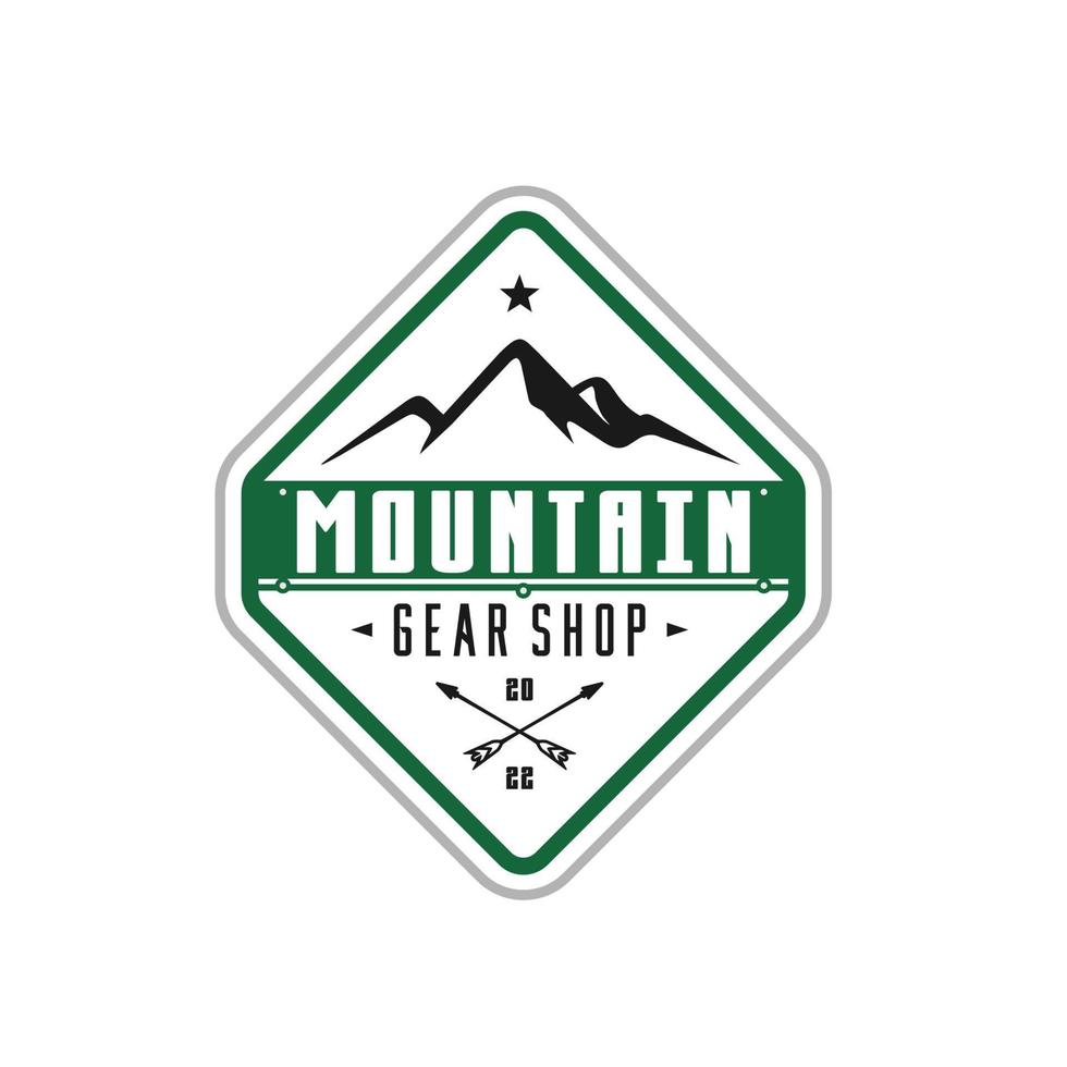 ispirazione per il design dell'emblema del logo della montagna vintage vettore