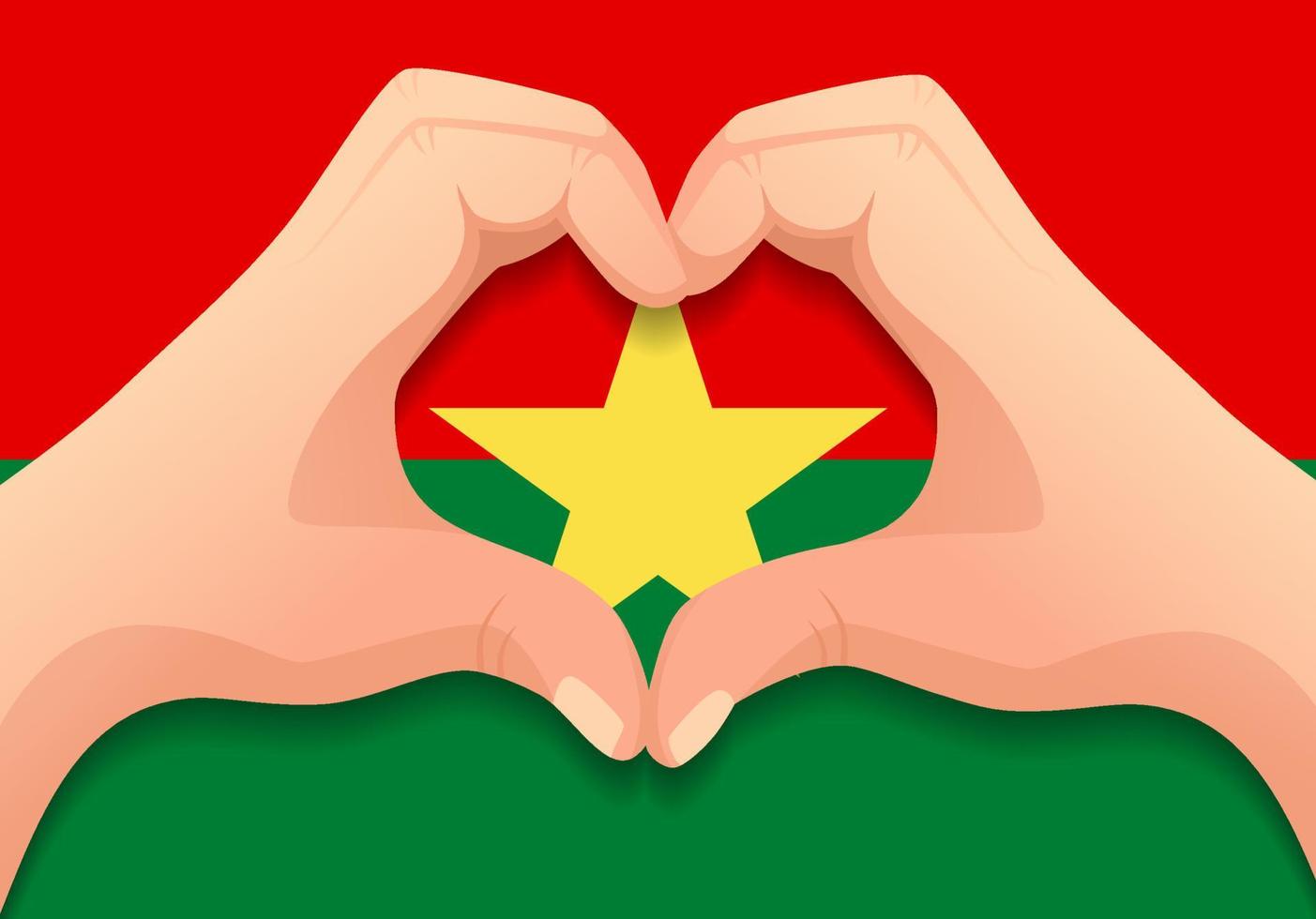 bandiera del burkina faso e mano a forma di cuore vettore