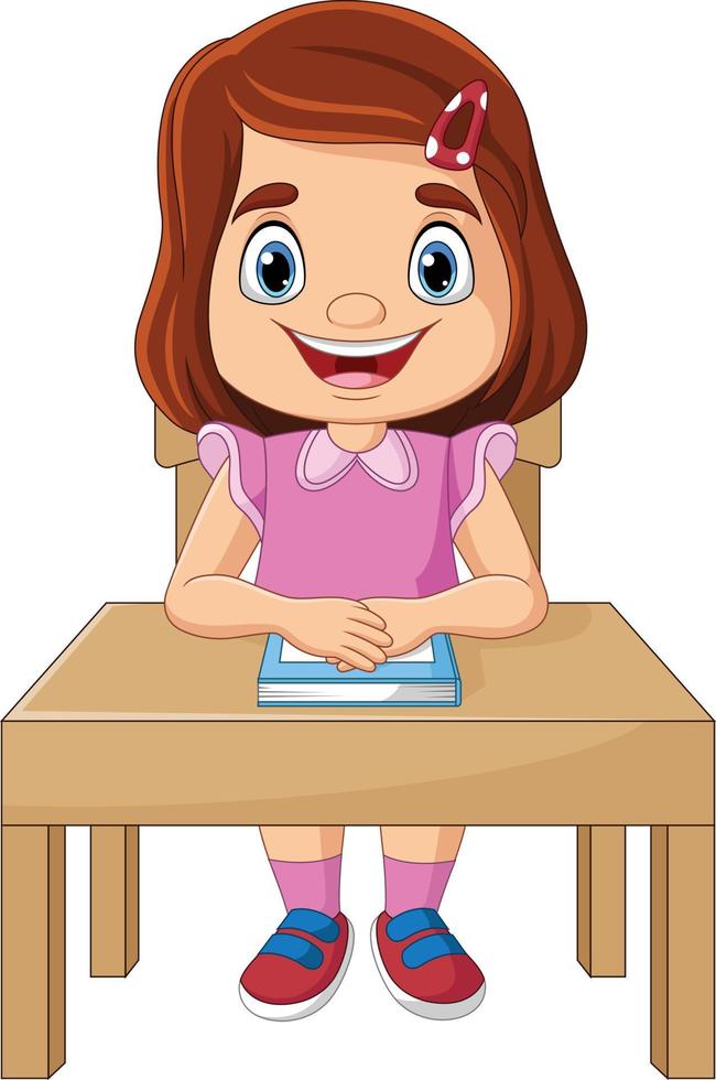 bambina del fumetto che studia sulla scrivania vettore