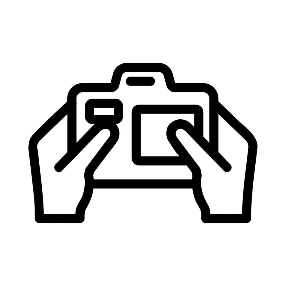 fotocamera nelle mani del vettore icona. illustrazione del simbolo del contorno isolato