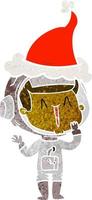 cartone animato retrò ridente di un astronauta che indossa il cappello di Babbo Natale vettore