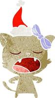 cartone animato retrò di un gatto che sbadiglia con il cappello di Babbo Natale vettore