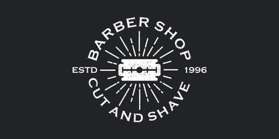 ispirazione per il logo del rasoio per il design vintage del barbiere vettore