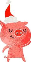felice retrò cartone animato di un maiale che indossa il cappello di Babbo Natale vettore
