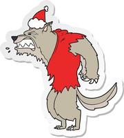 adesivo lupo mannaro arrabbiato cartone animato di un cappello da Babbo Natale con indosso vettore