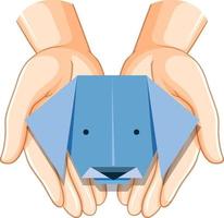 mani umane che tengono origami di cane vettore