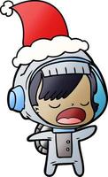 cartone animato sfumato di una donna astronauta parlante che indossa il cappello di Babbo Natale vettore