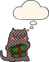 cartone animato gatto di natale e bolla di pensiero in stile fumetto vettore