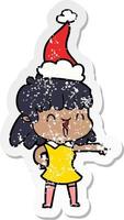 adesivo in difficoltà cartone animato di una ragazza felice che indossa il cappello di Babbo Natale vettore