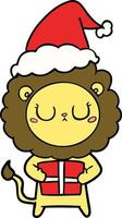disegno a tratteggio di un leone con regalo di Natale che indossa il cappello di Babbo Natale vettore