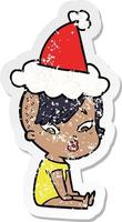 adesivo in difficoltà cartone animato di una ragazza sorpresa che indossa il cappello di Babbo Natale vettore