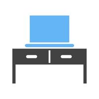 scrivania e il computer portatile glifo blu e nero icona vettore