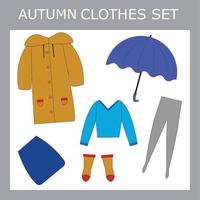 un set di vestiti per una bella bambina in autunno vettore