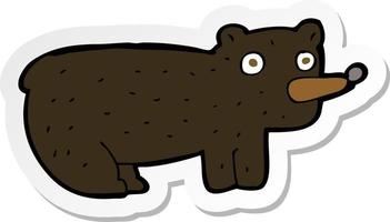 adesivo di un divertente cartone animato orso nero vettore