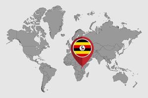 mappa pin con bandiera dell'uganda sulla mappa del mondo. illustrazione vettoriale. vettore