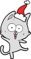 disegno divertente di un gatto che indossa il cappello di Babbo Natale vettore